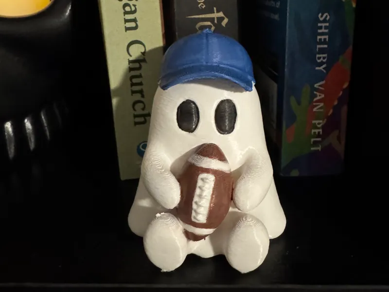 Ghost holding football