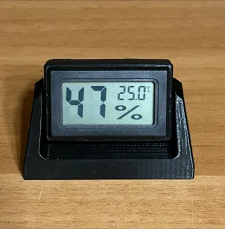 Adjustable thermometer holder