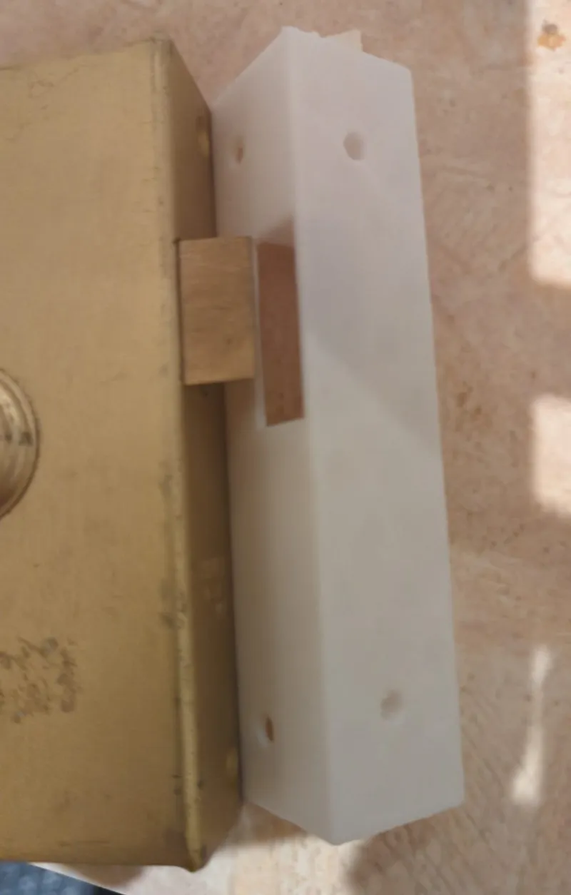 Lock striker plate