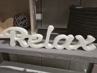 Relax Schriftzug