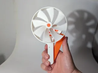 Squeeze Powered Flywheel Fan