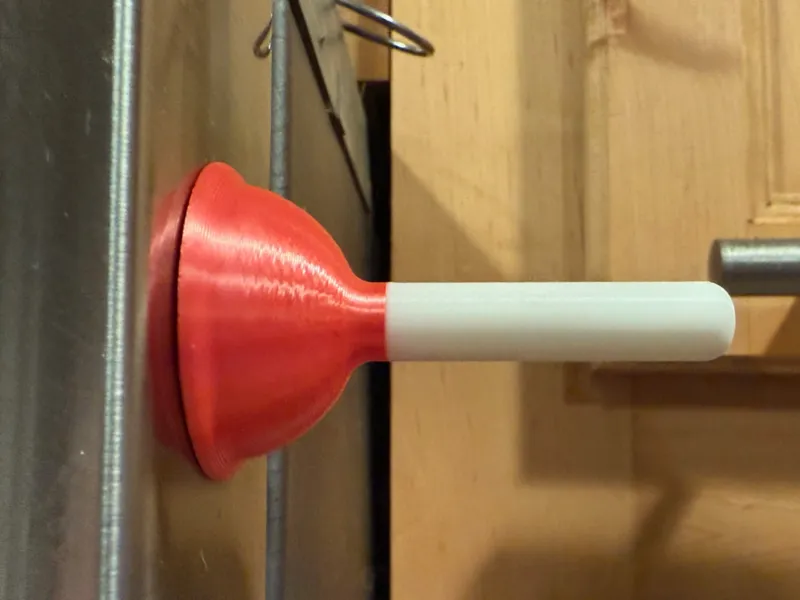 Plunger refrigerator magnet