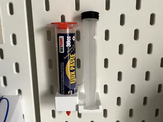 Flux tube and plunger holder for IKEA SKADIS