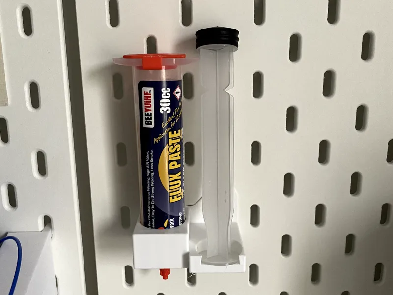 Flux tube and plunger holder for IKEA SKADIS