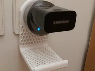 Soporte de pared para teléfono