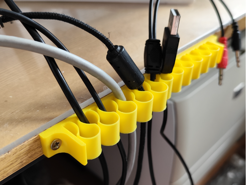 Universal cable holder