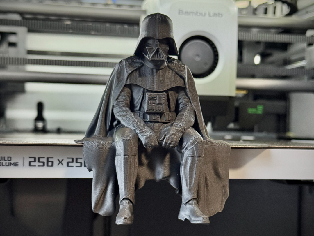 Sad Darth Vader sitting on a ledge figurine!