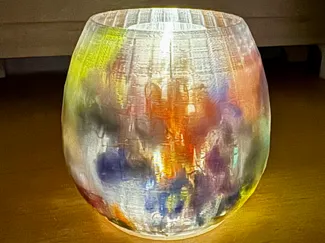 Tea light with filament waste (Poops)