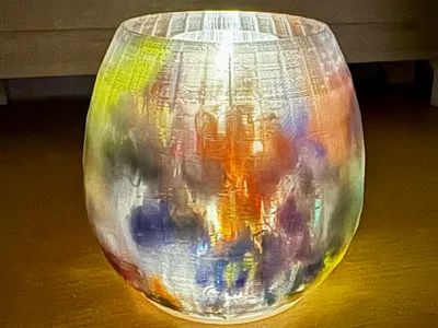 Tea light with filament waste (Poops)
