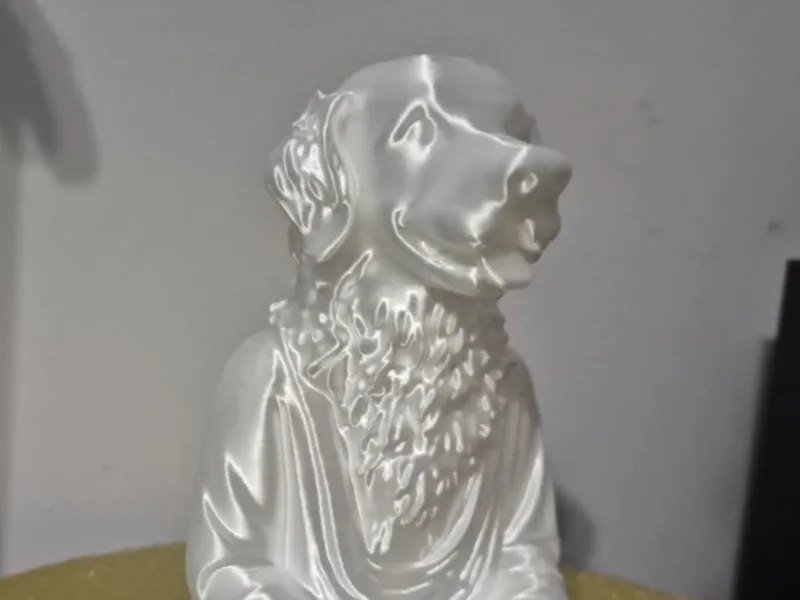 golden retriever dog figurine buddha