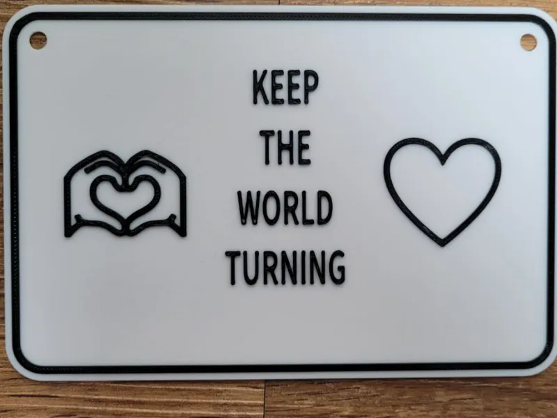 Keep the World turning Schild