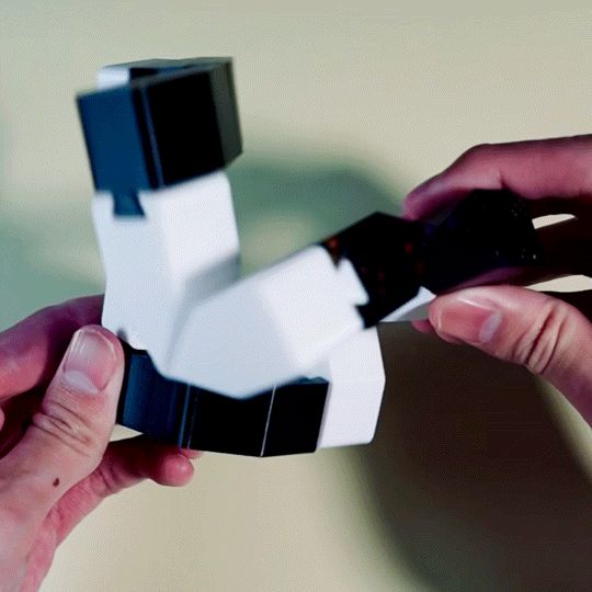TPU 6-bar spatial linkage fidget toy