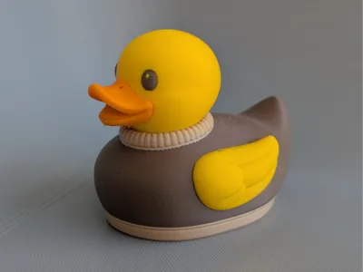 Sweater Duck – Cozy Rubber Ducky Figurine