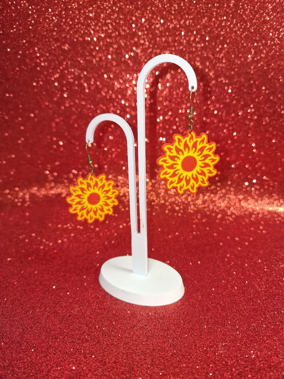 Flaming sun earrings view 3