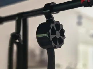 Strap retractor for gymnastic rings