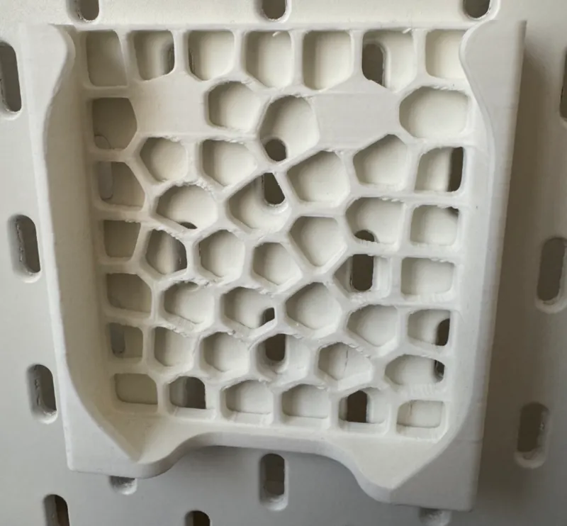 iPhone 15 pro with case, skadis ikea stand