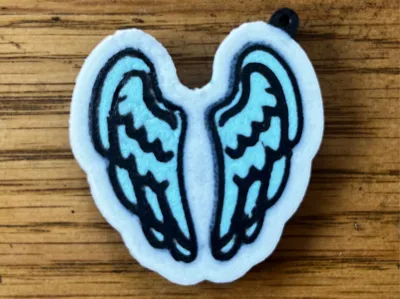 Coldplay Wing Keychain