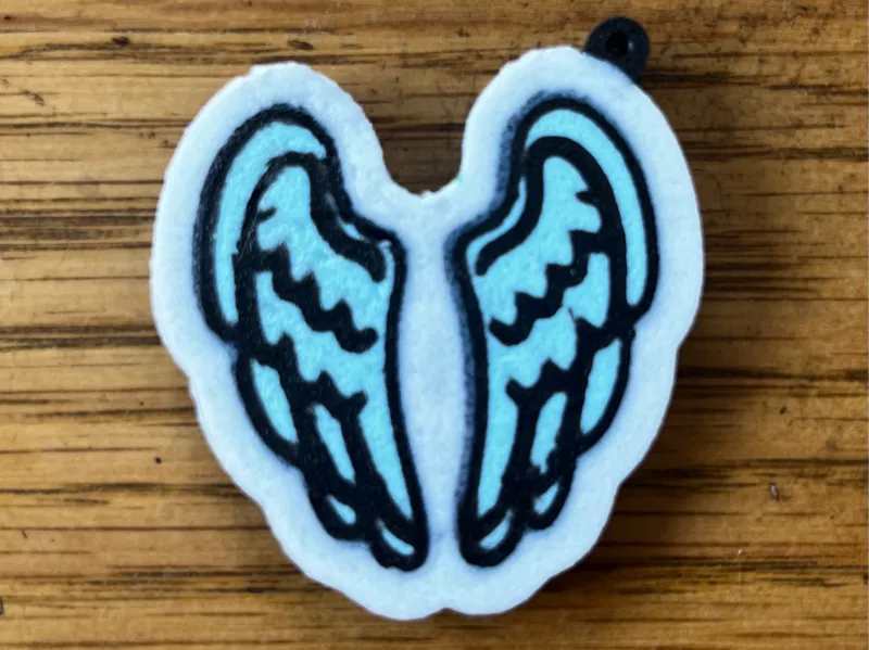 Coldplay Wing Keychain