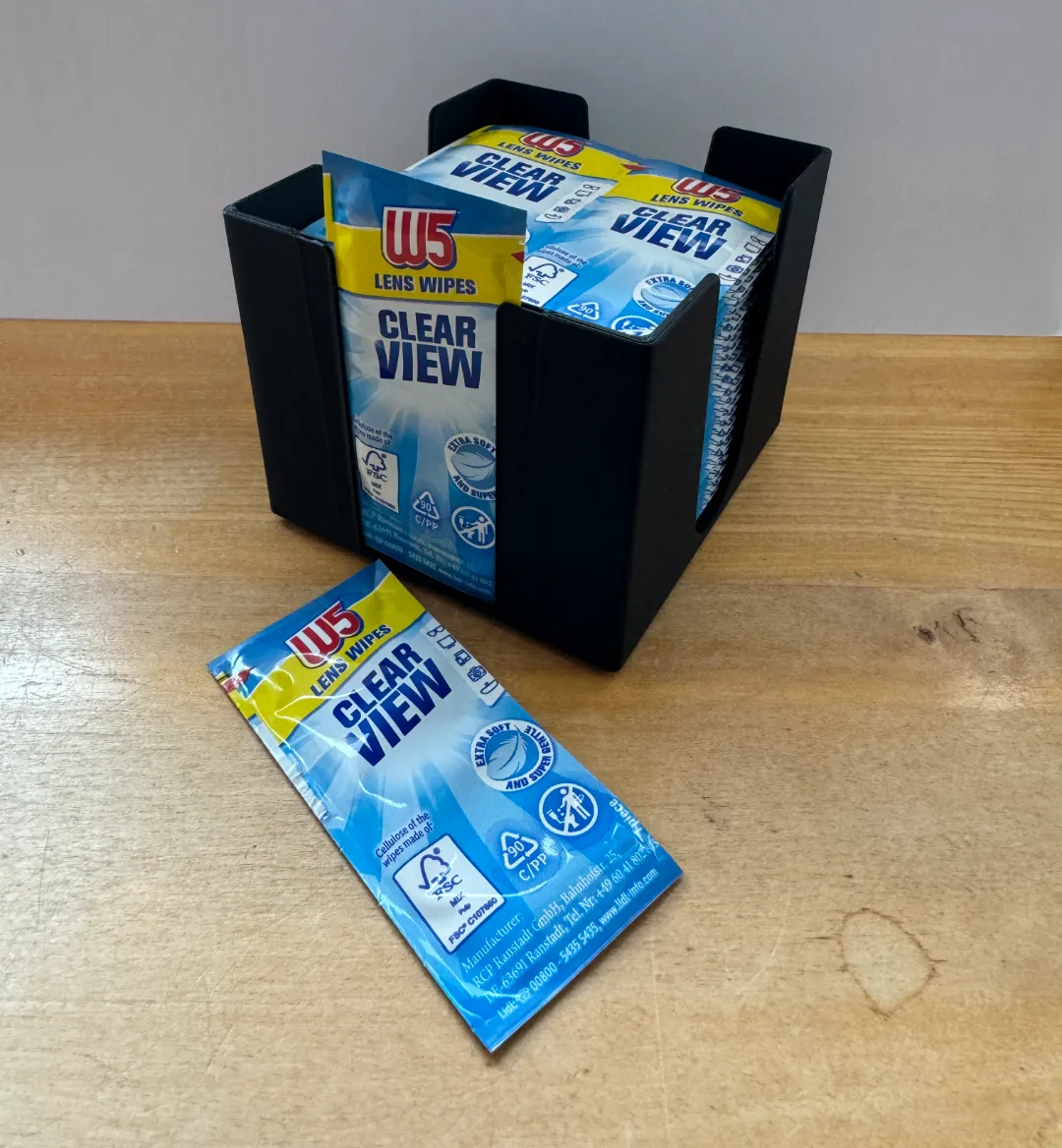 Distributeur de lingettes nettoyantes pour lunettes