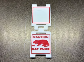 caution cat puke