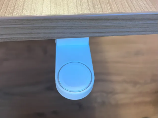 Apple Watch charger under the desk