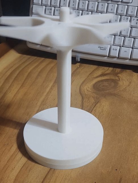 Rotating razor holder, rotating razor stand