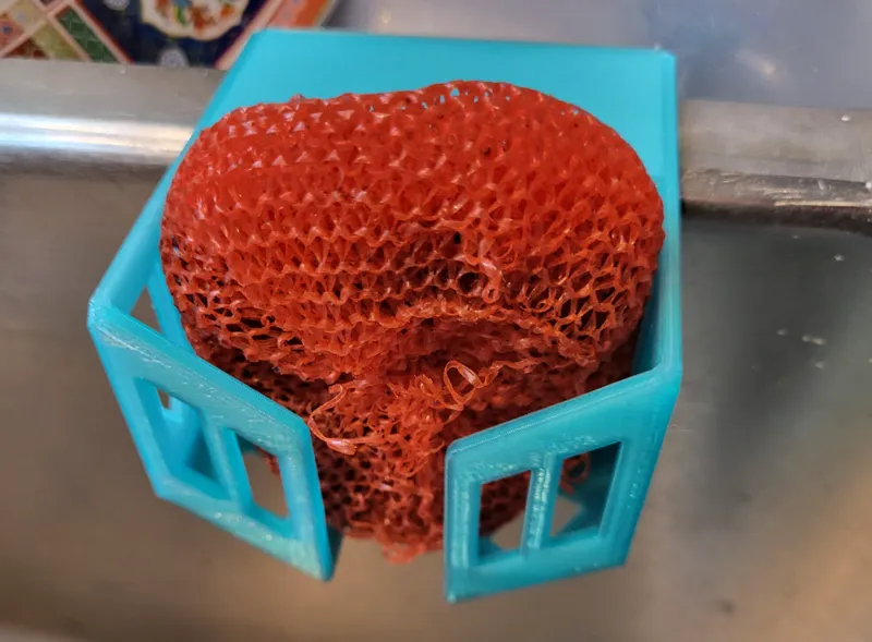 Caddy for nylon sponge split sink