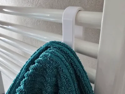 Bathroom heated towel rail hook