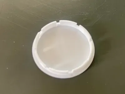 Cabinet door hole plug