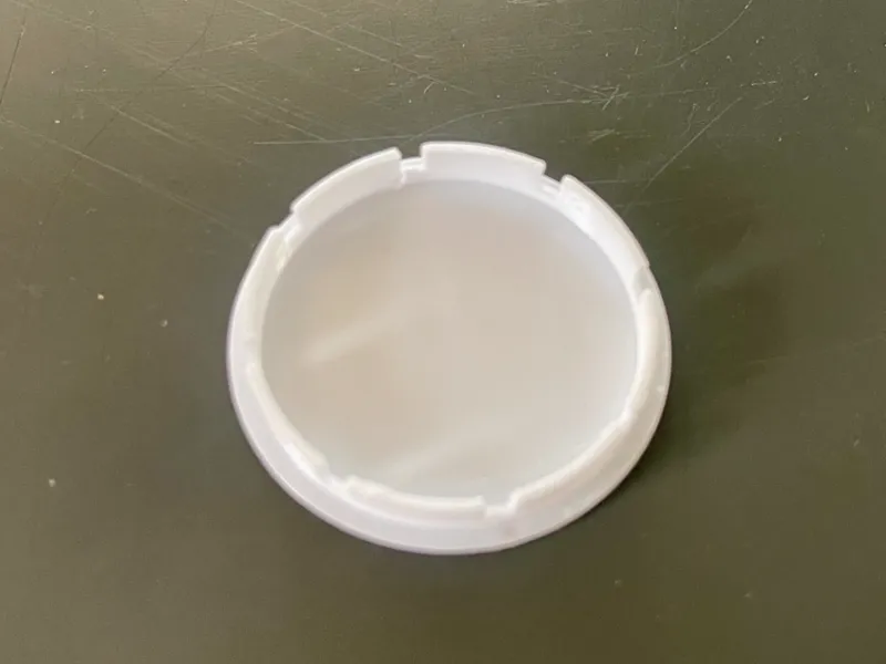 Cabinet door hole plug
