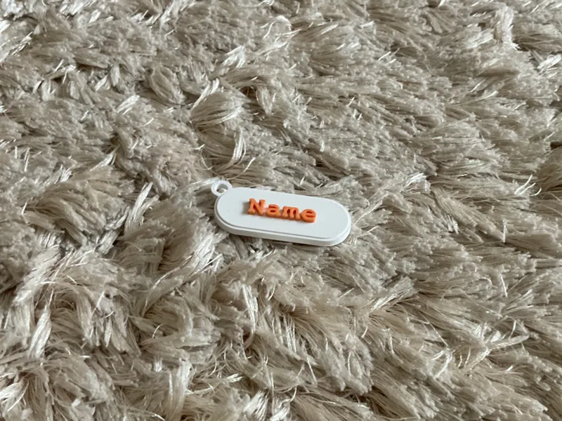 Customizable name tag keychain