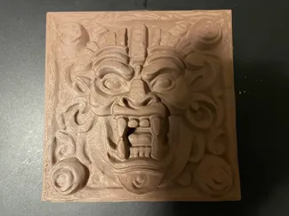 Mayan style fierce creature bas-relief