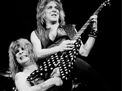 Ozzy Holding Randy