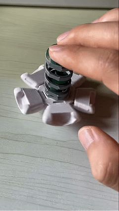 Fidget ball spring accessory, rubber band free alternative