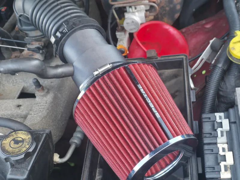 Jeep stock intake tube to conical filter adapter.