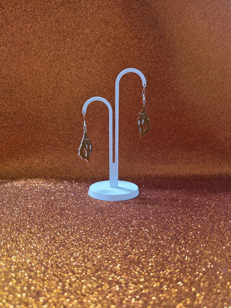 Triton shell earrings view 3