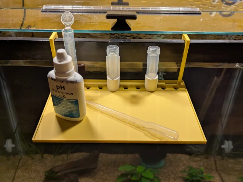 Framed aquarium shelf for water test