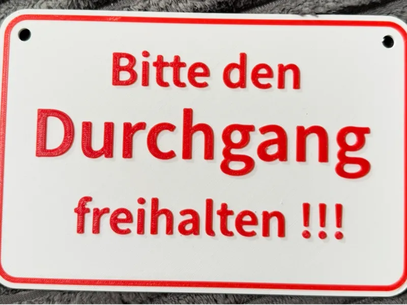 Schild Bitte den Durchgang freihalten