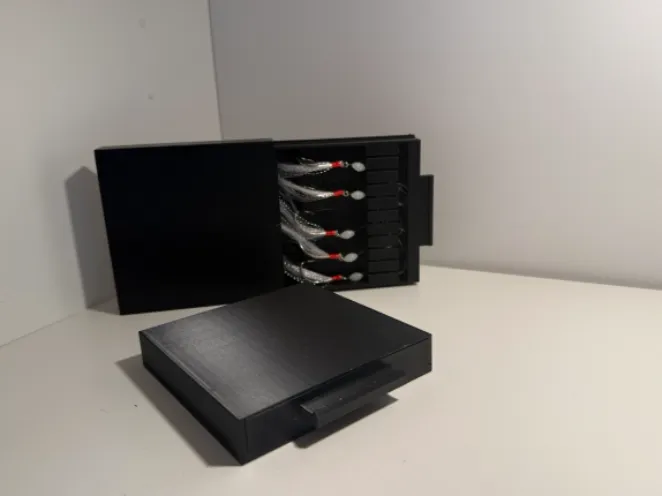 Fishing heckle storage box