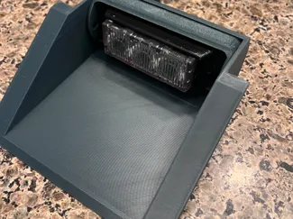 Adjustable LED windshield shroud. 