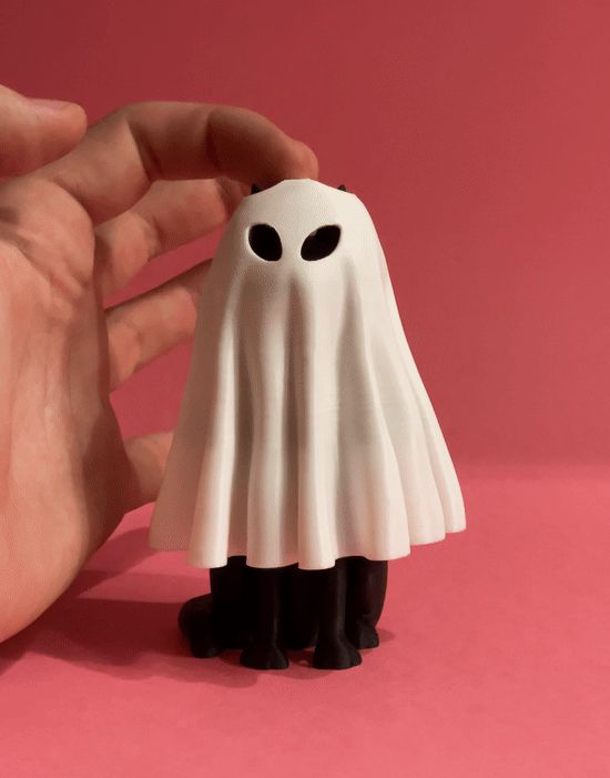 moving Halloween cat on a pen spring