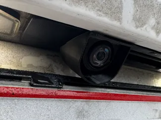 Tesla rear camera shield