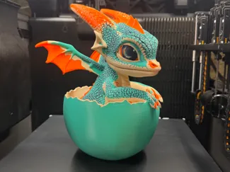 baby dragon emerging from egg 