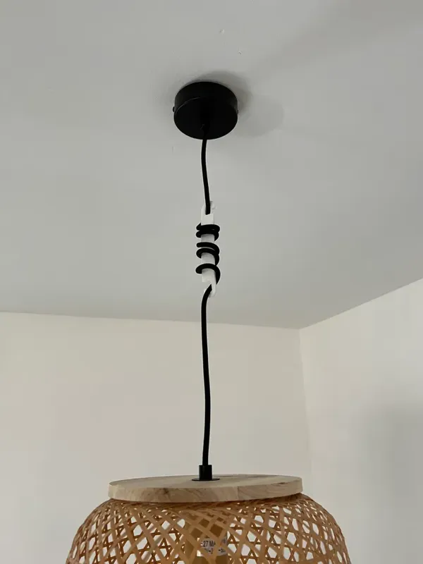 Raccourcisseur de câble pour suspension