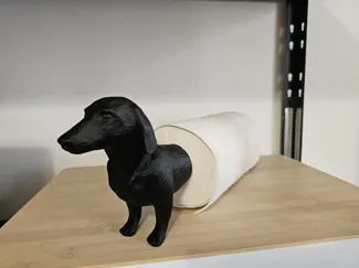 Wiener dog paper towel holder.