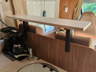 Shelf angles for mounting a shelf in a motorhome