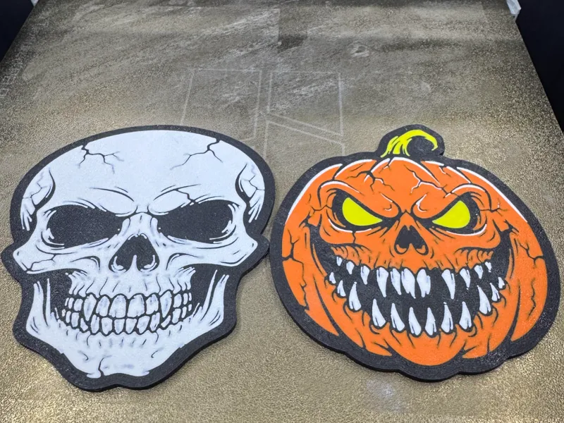 Creepy pumpkin and vampire skull coasters