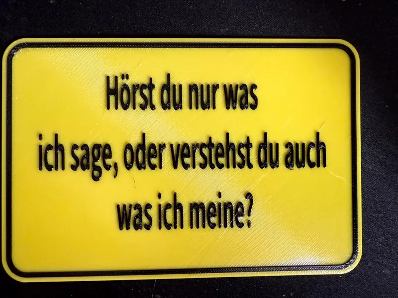 Hörst du nur was ich sage, oder verstehst ..Schild