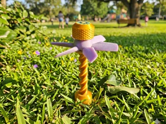 Spiral fidget stick with a little flower