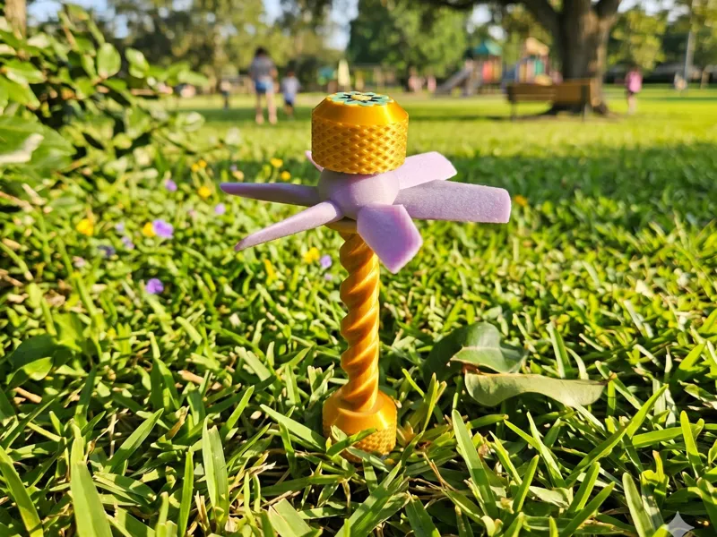 Spiral fidget stick with a little flower